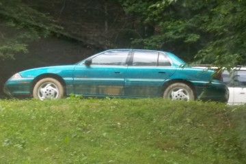 Junk 1995 Pontiac Grand Am Photography