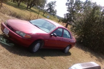 Junk 1998 Ford Escort Photography