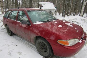 Junk 1999 Ford Escort Photography