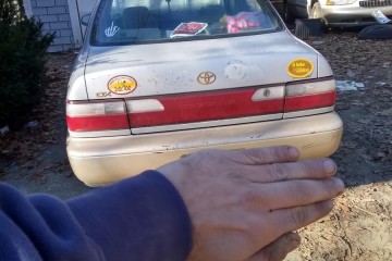 Junk 1996 Toyota Corolla Photo